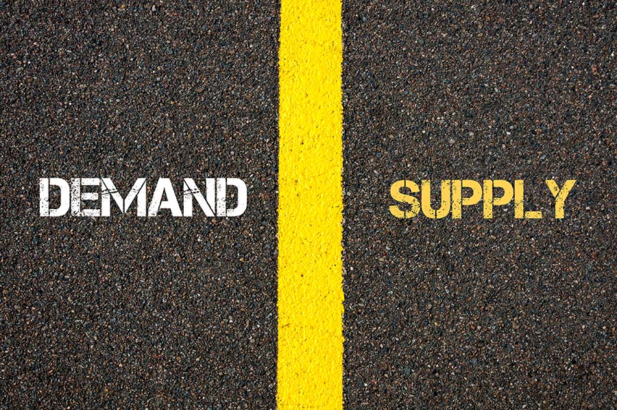 Photo of used oil barrels and chart graphic